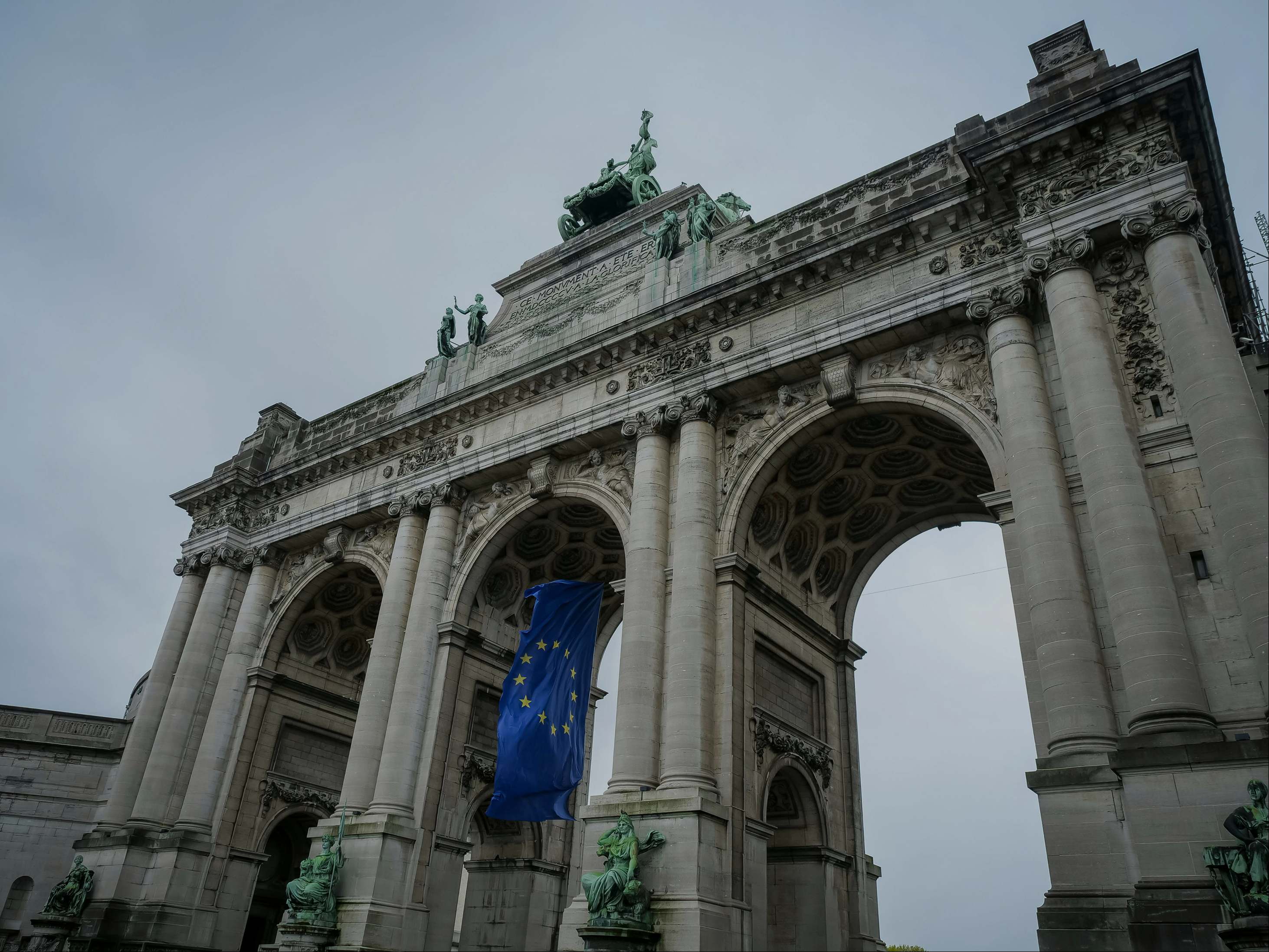 Cinquantenaire arch in Brussels with EU flag